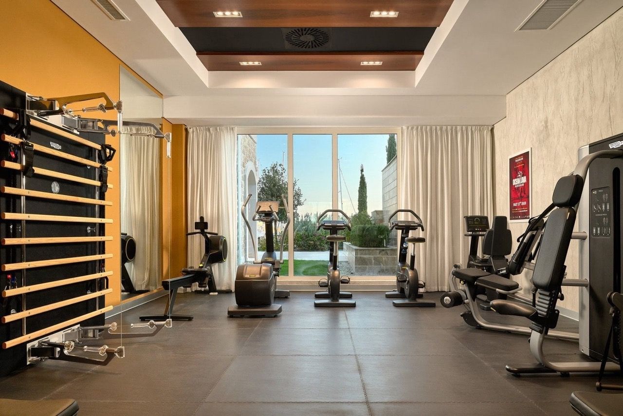 Modern gym with professional equipment in the luxury Luštica Bay complex, Radovići, Montenegro.