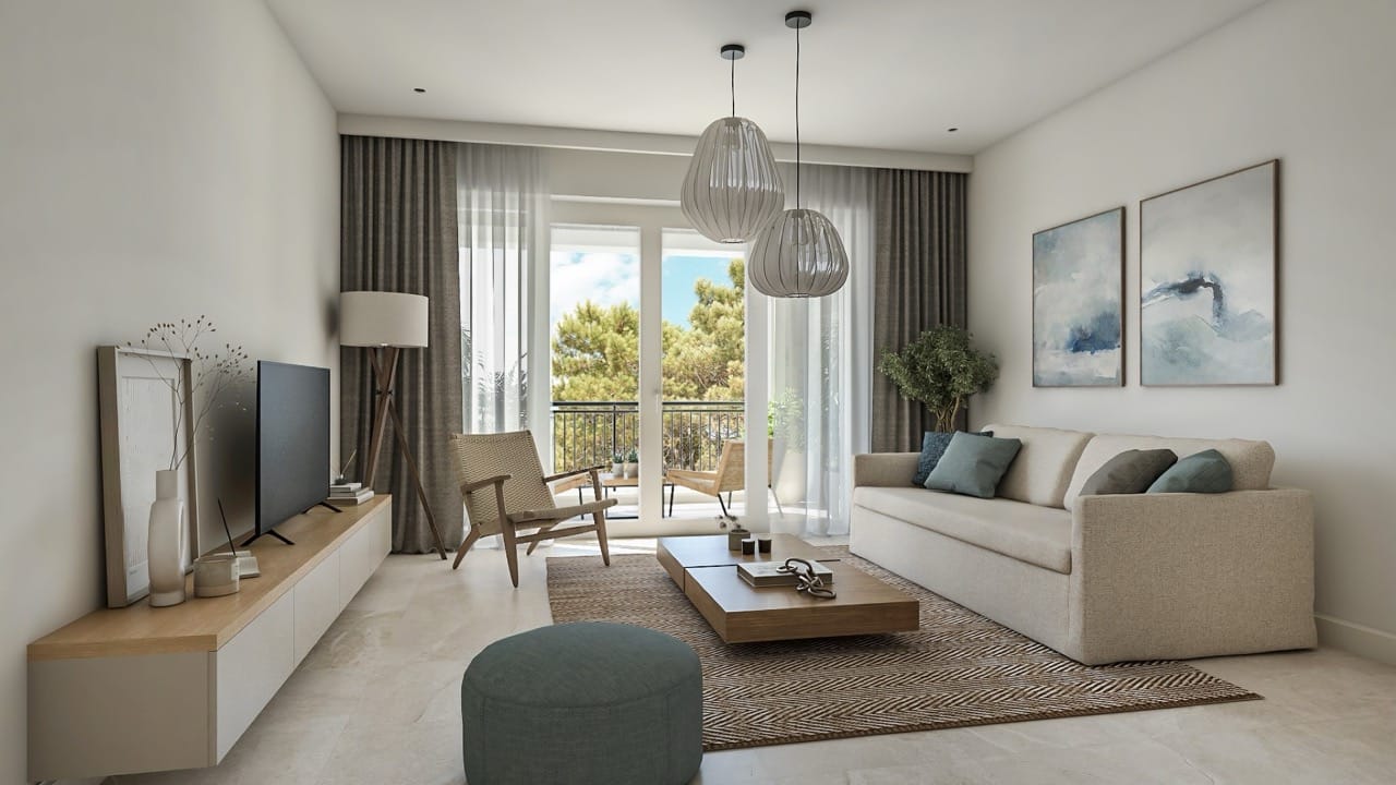 Modern living room in an apartment in Lustica Bay, Radovici, Montenegro: light furniture, terrace with a view of the pine trees.