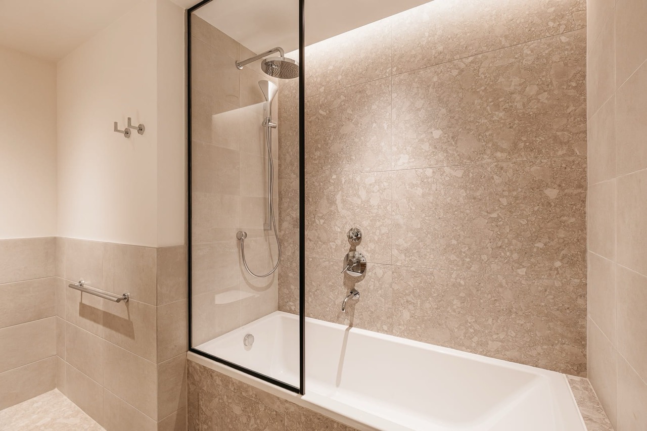 Modern bathroom with a shower cabin in an apartment in Porto Montenegro, Tivat, Montenegro.