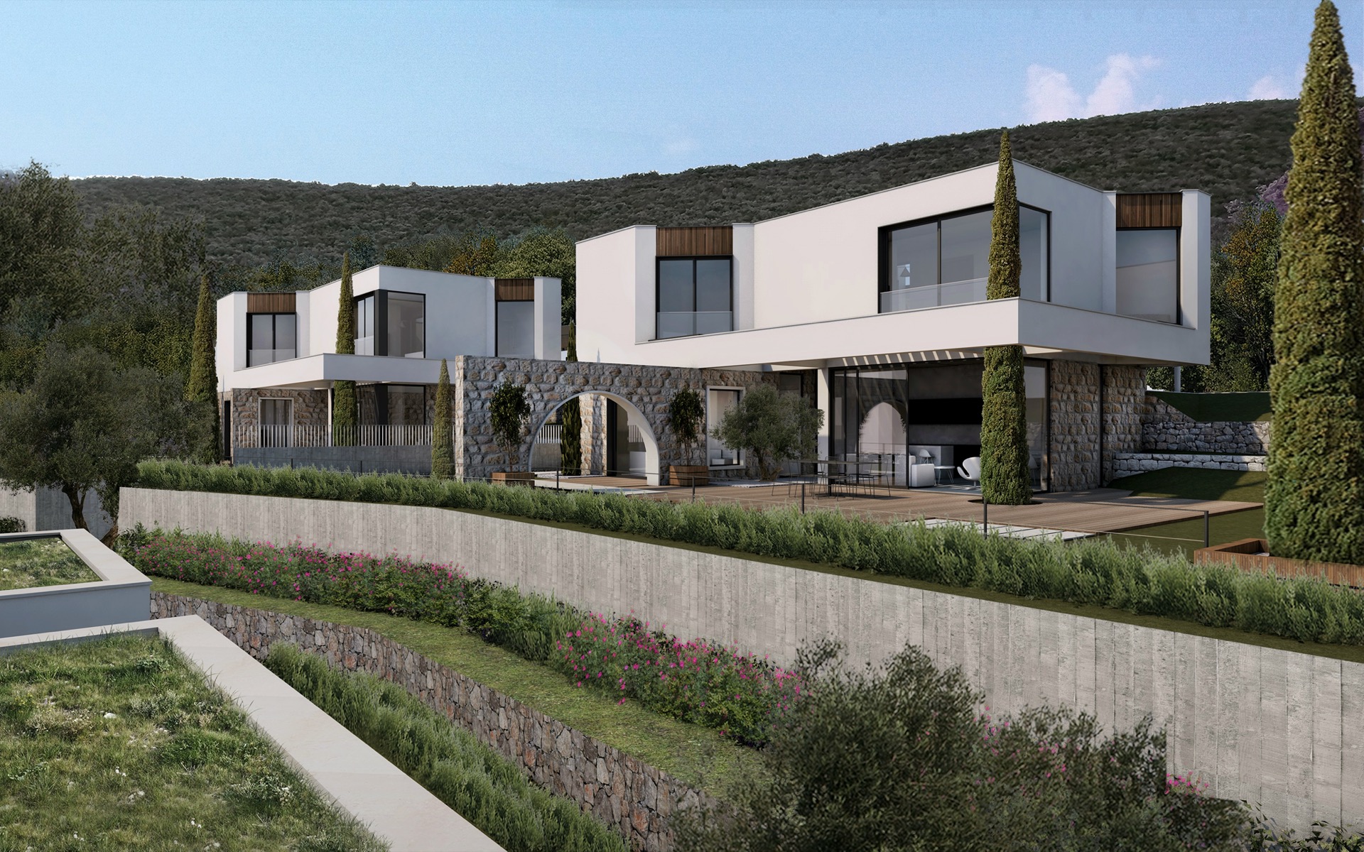 Modern villas with stone cladding and terraces in Herceg Novi, Montenegro: view of the residential complex with landscaping.