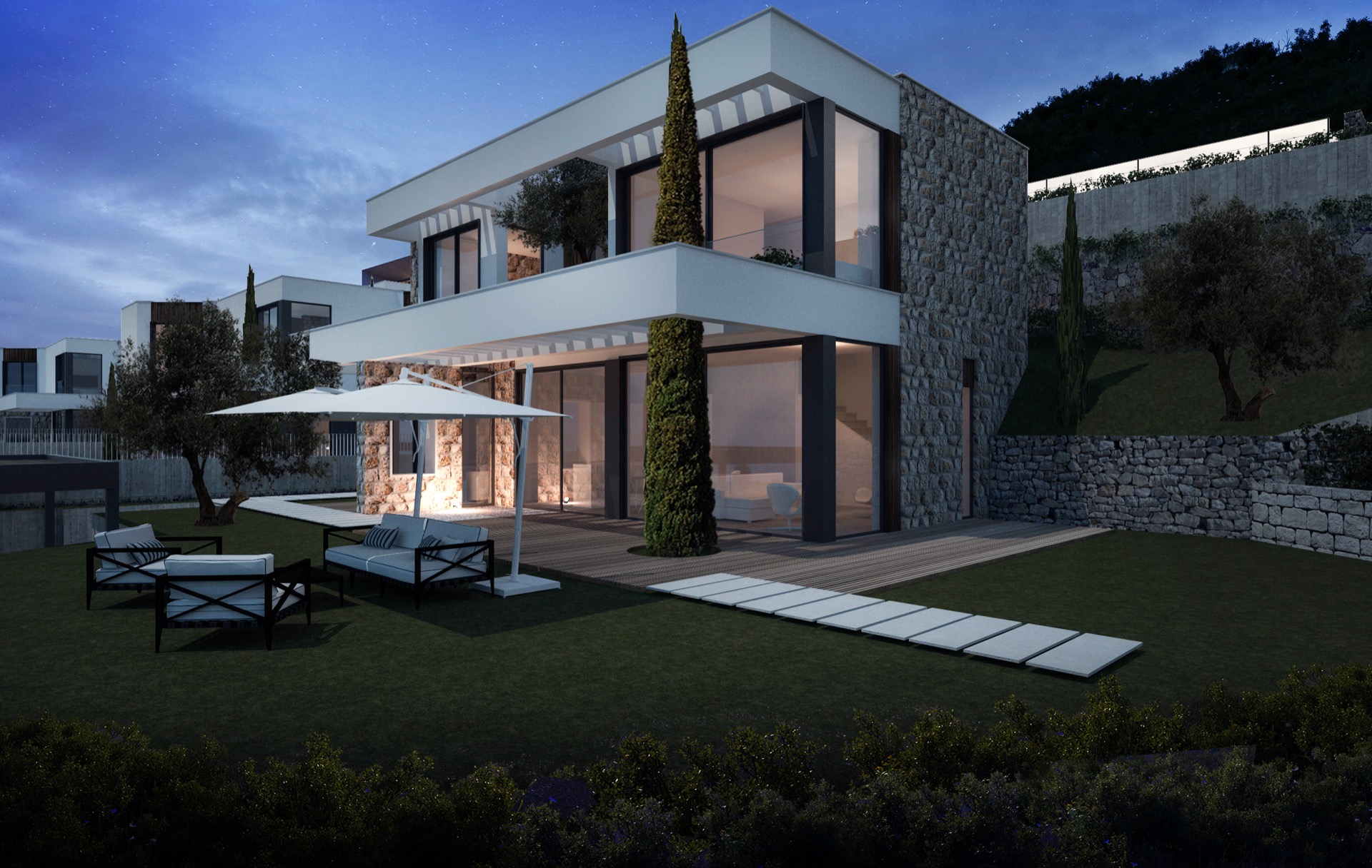 Modern two-story house with stone facade and balcony under a night sky.