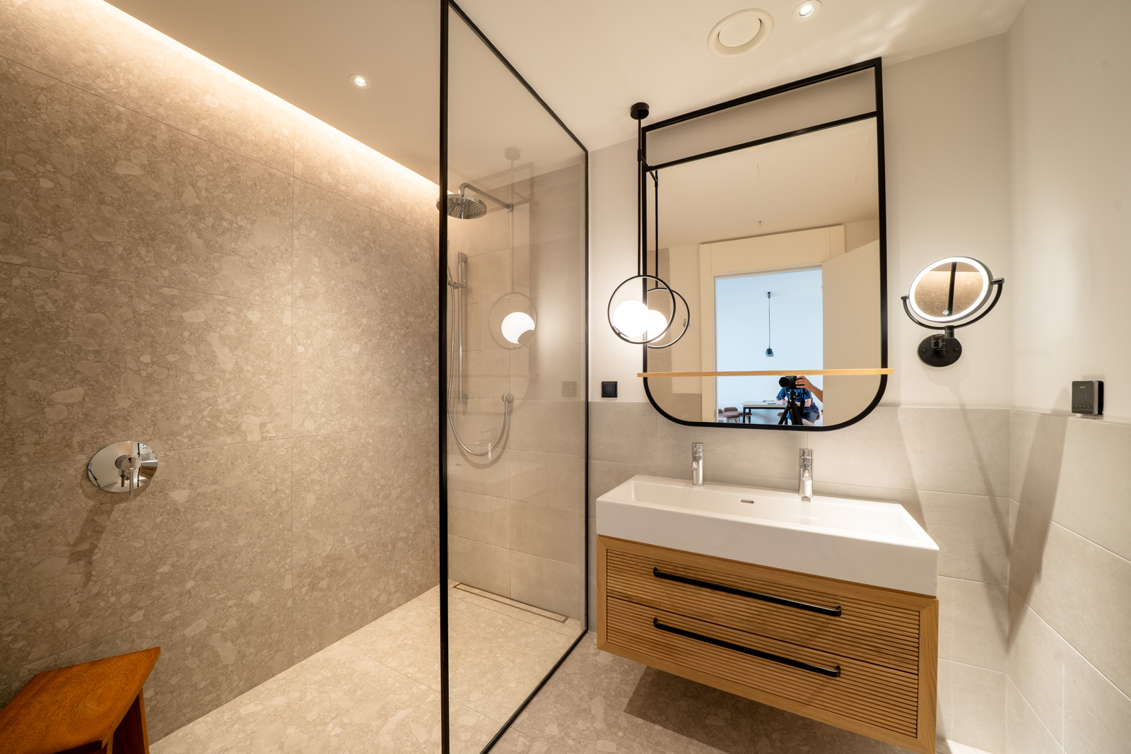 Modern bathroom in an apartment in Porto Montenegro, Tivat, Montenegro: glass shower and stylish vanity.