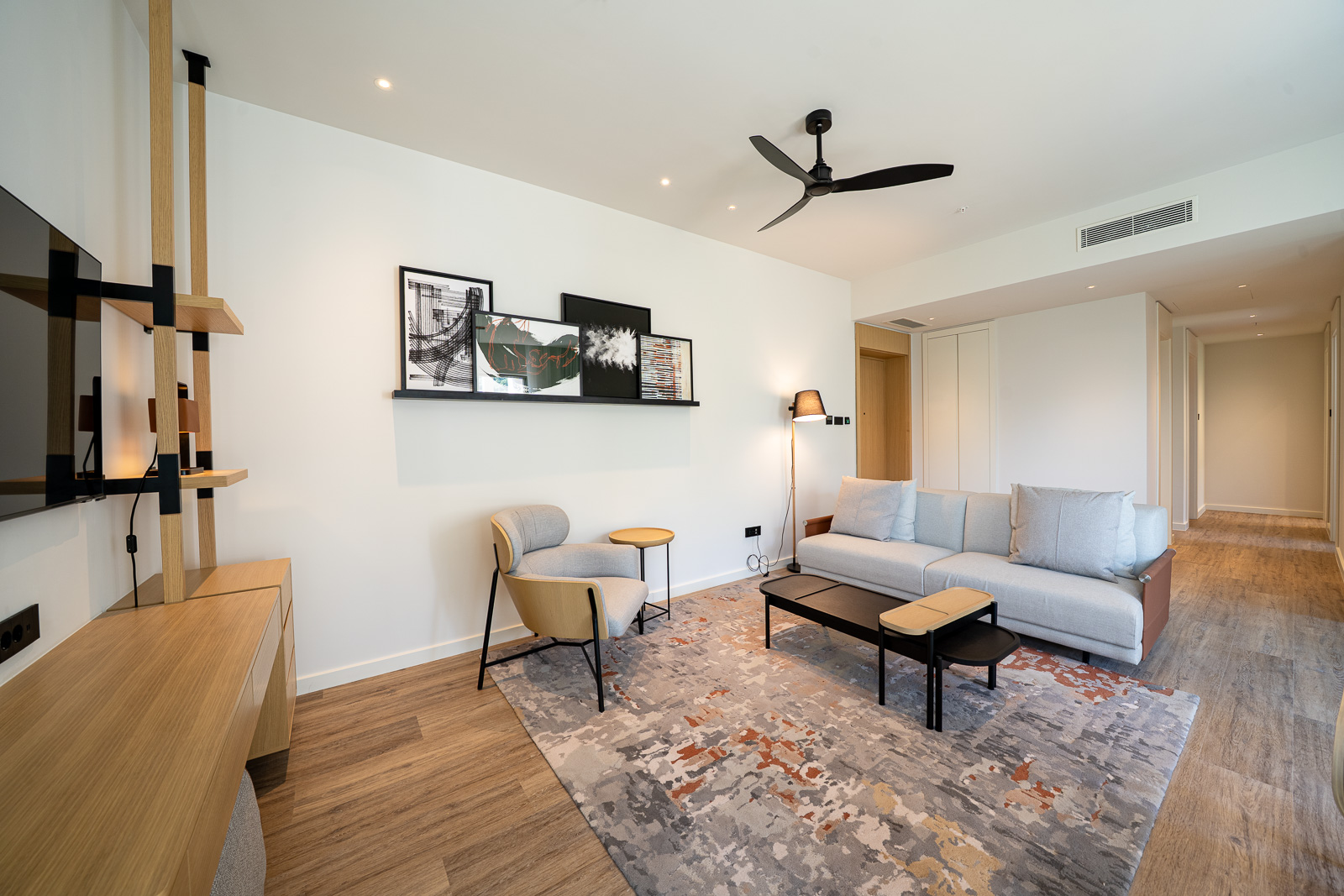 Modern living room in an apartment in Porto Montenegro, Tivat, Montenegro: stylish furniture, decor, and parquet flooring.