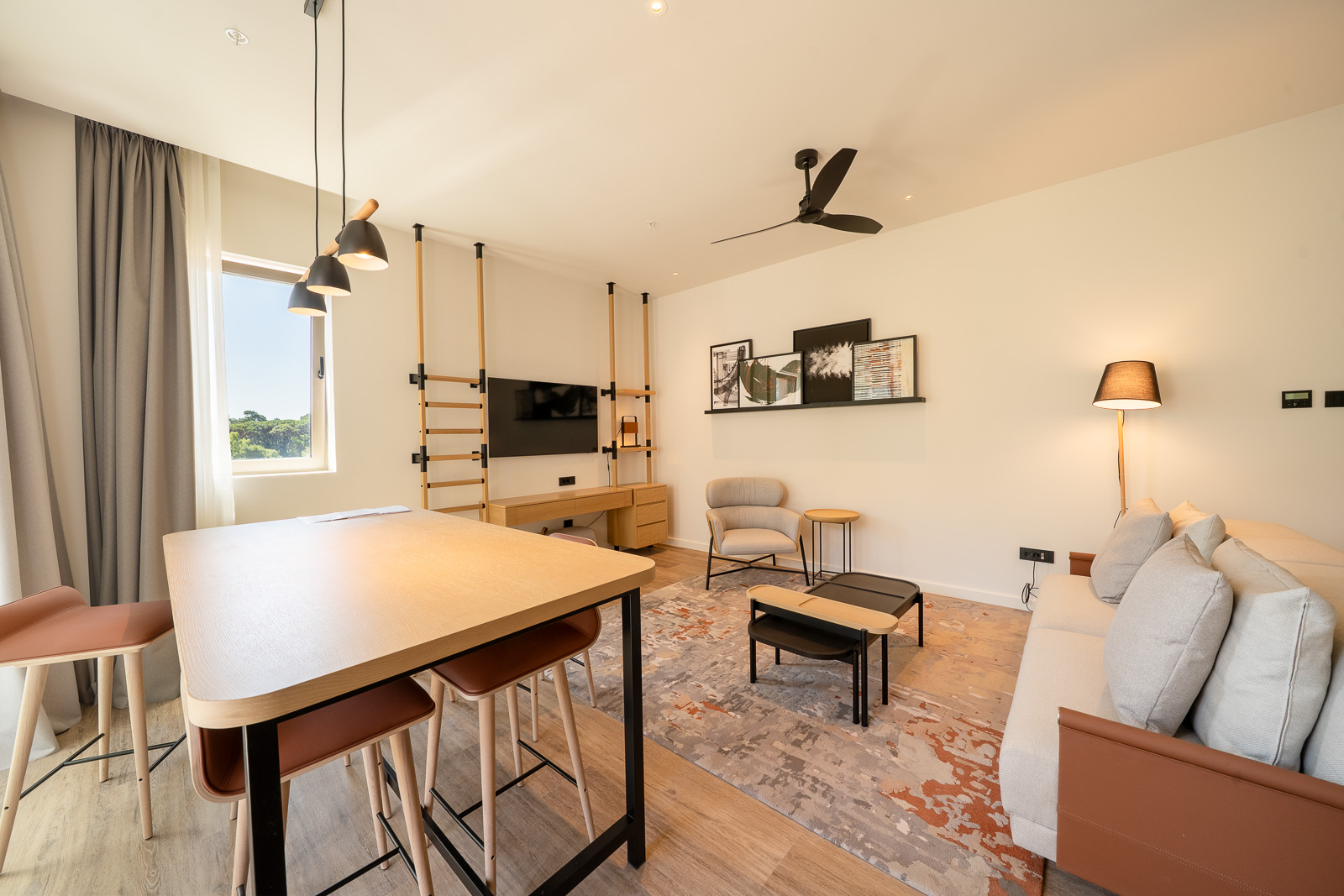 Modern living room with dining area in an apartment in Porto Montenegro, Tivat, Montenegro: stylish furniture and decor.