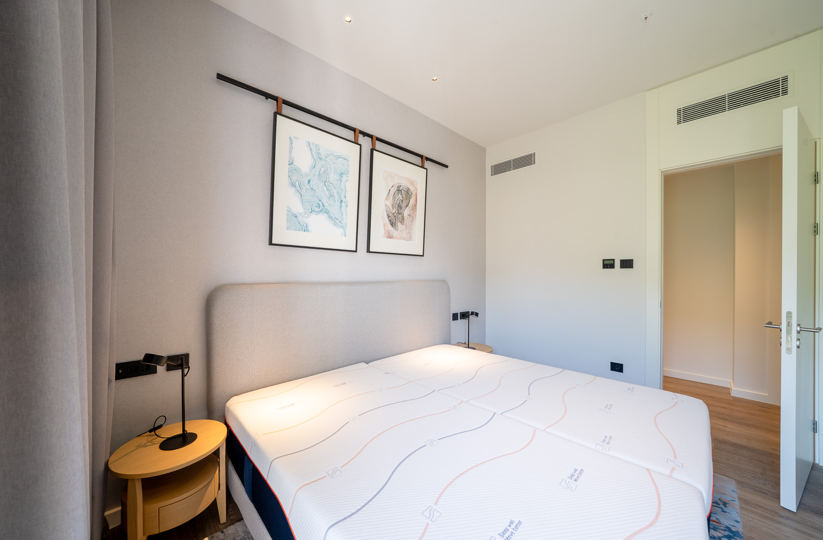 Modern bedroom in Porto Montenegro apartments, Tivat, Montenegro: double bed, decor, and stylish furniture.