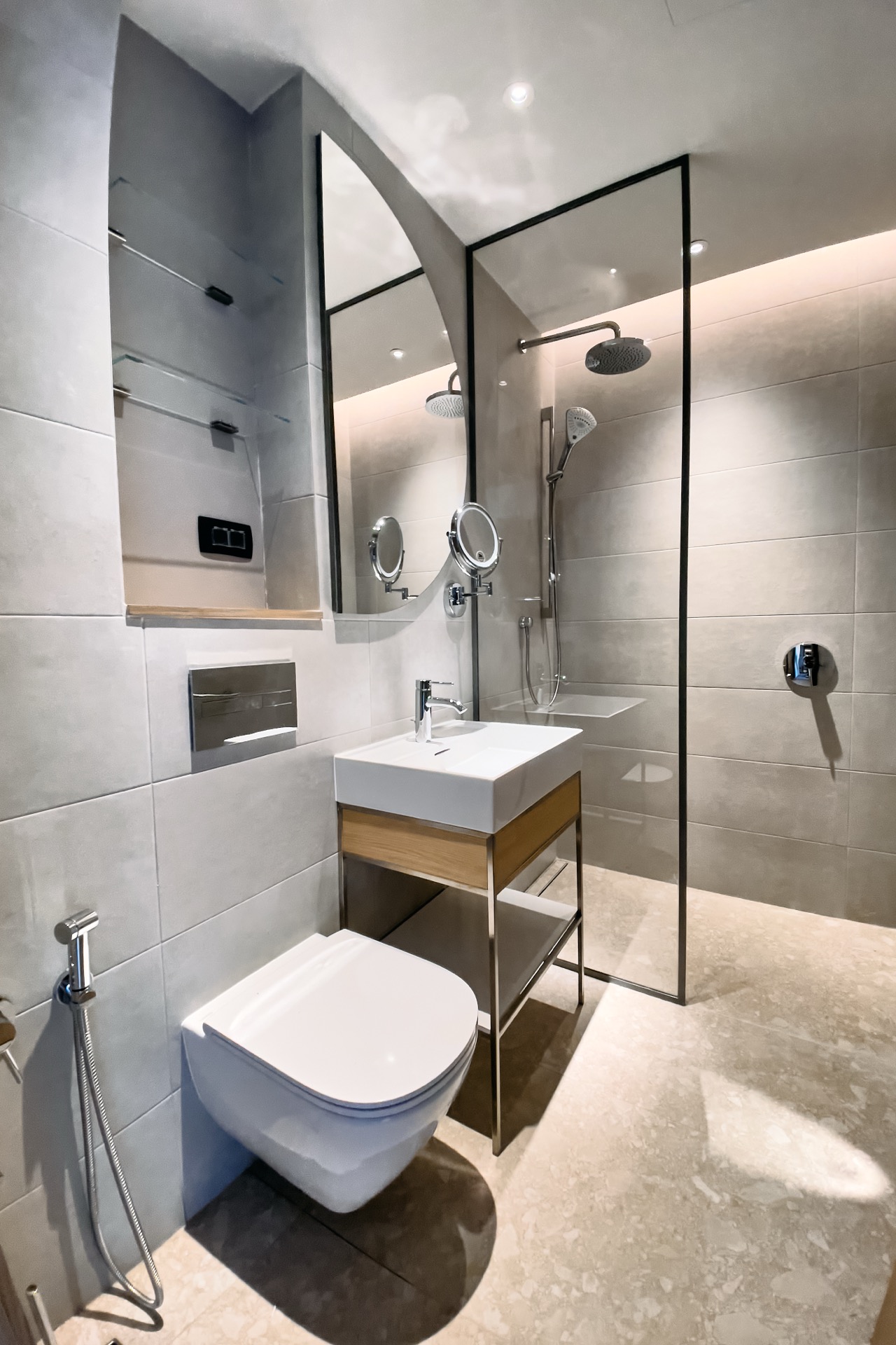 Modern bathroom in an apartment in Porto Montenegro, Tivat, Montenegro: shower cabin, stylish fixtures.