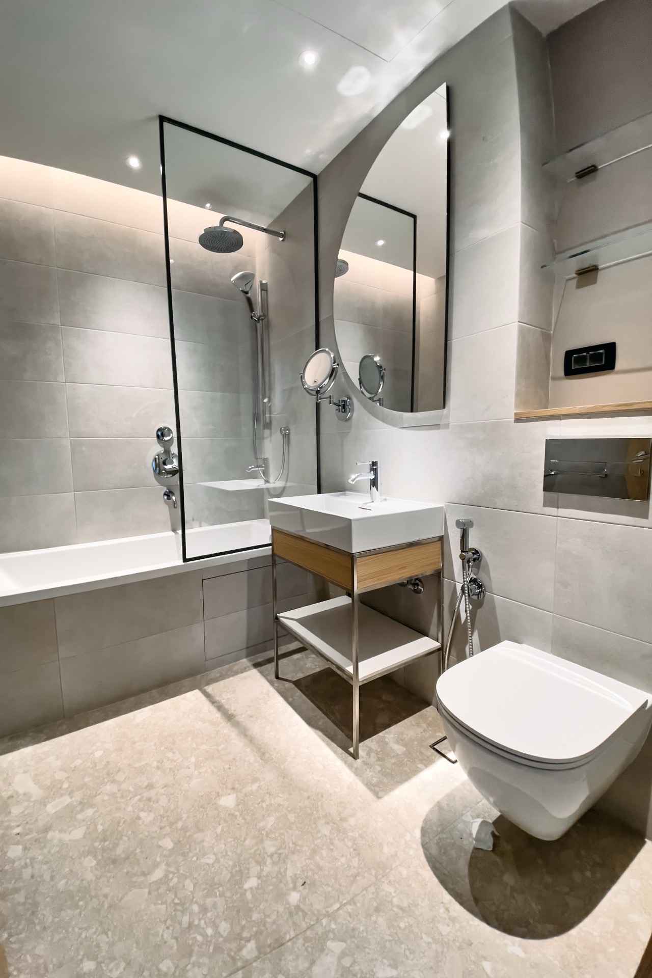 Modern bathroom in an apartment in Porto Montenegro, Tivat, Montenegro: glass shower, stylish fixtures.