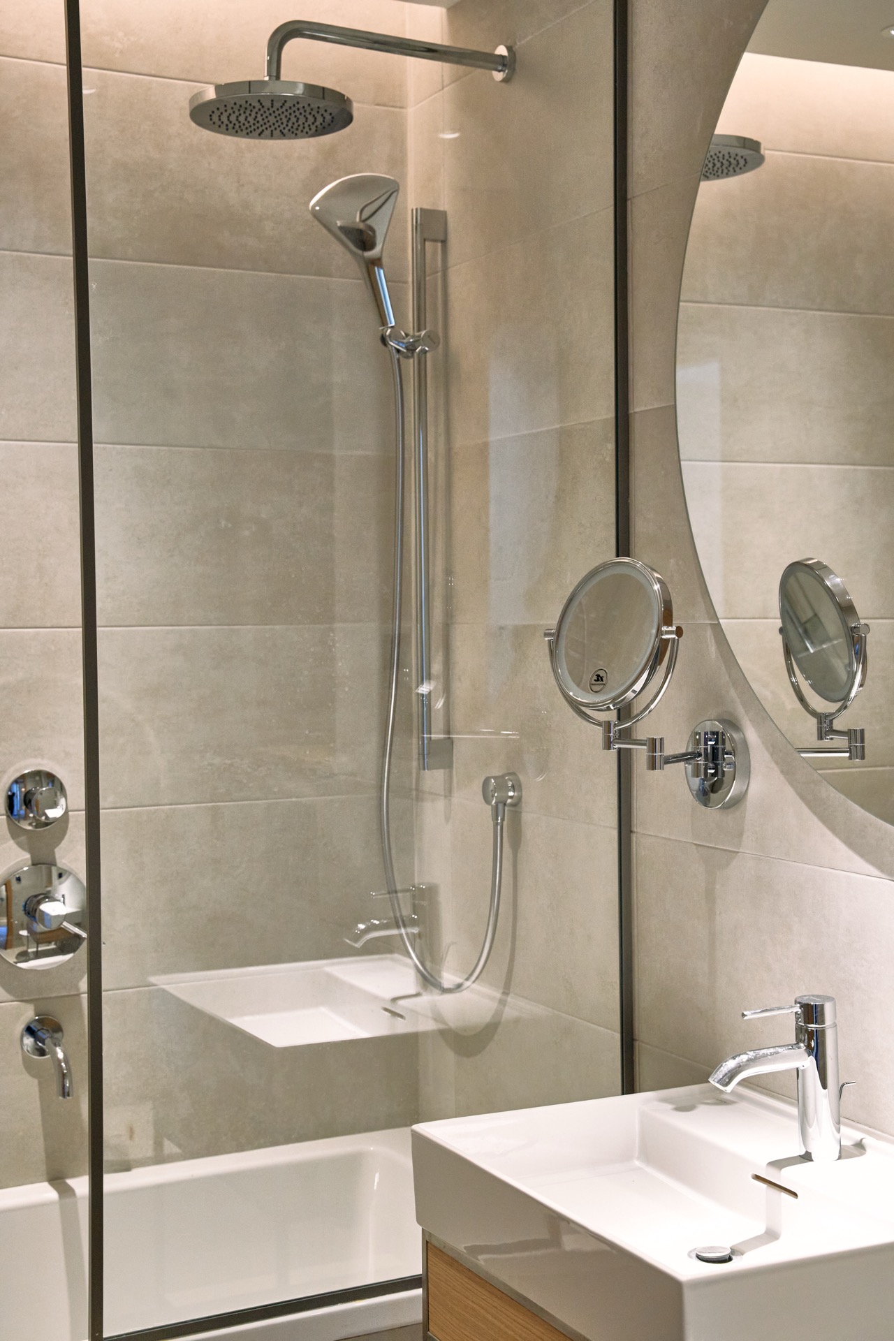 Modern bathroom in an apartment in Porto Montenegro, Tivat, Montenegro: shower cabin, stylish fixtures.