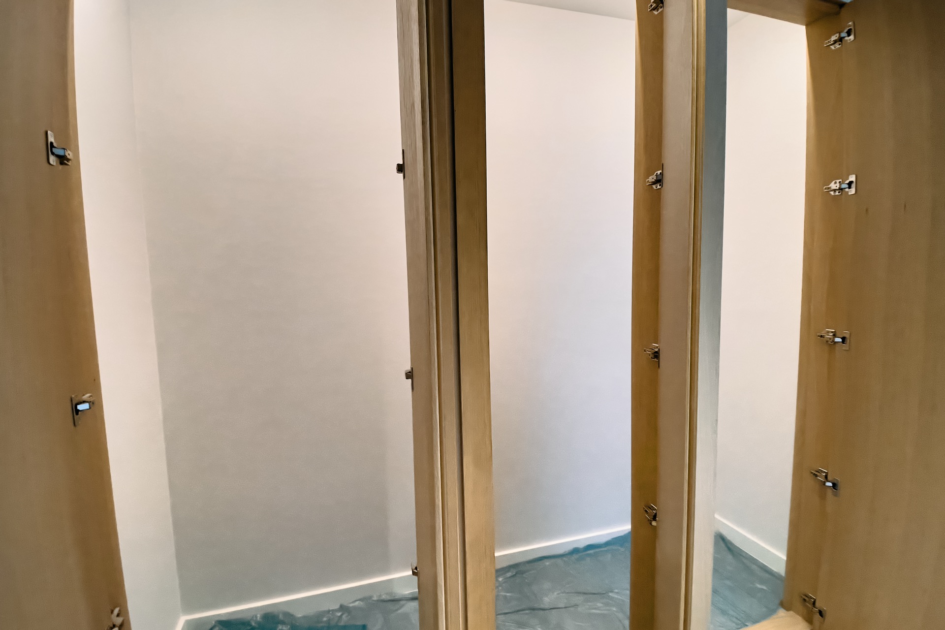 Built-in wardrobe made of light wood in an apartment under construction, Porto Montenegro, Tivat, Montenegro.