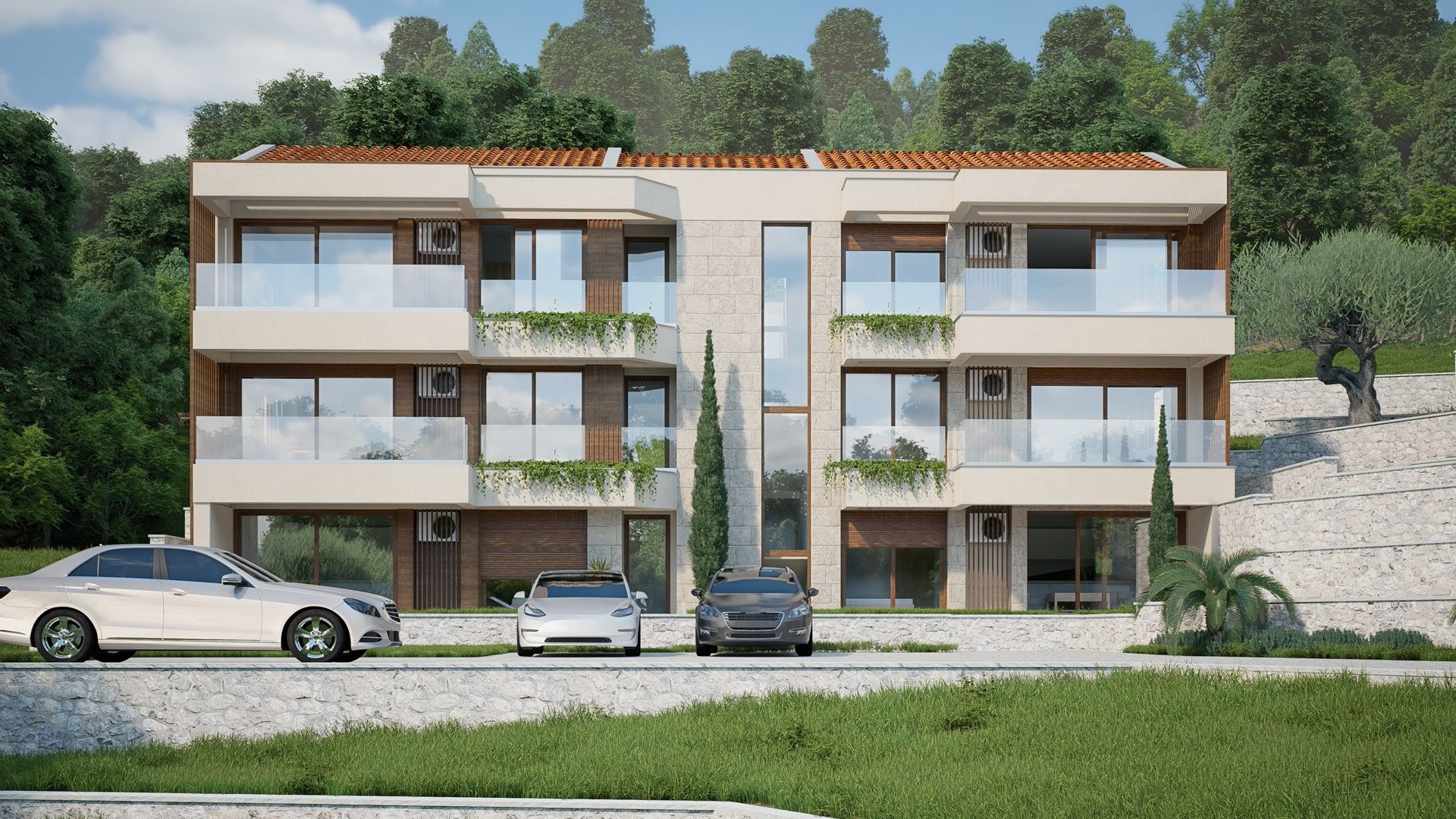 Modern residential complex in Blizikuće, Montenegro: a three-story building with terraces, panoramic windows, and parking.