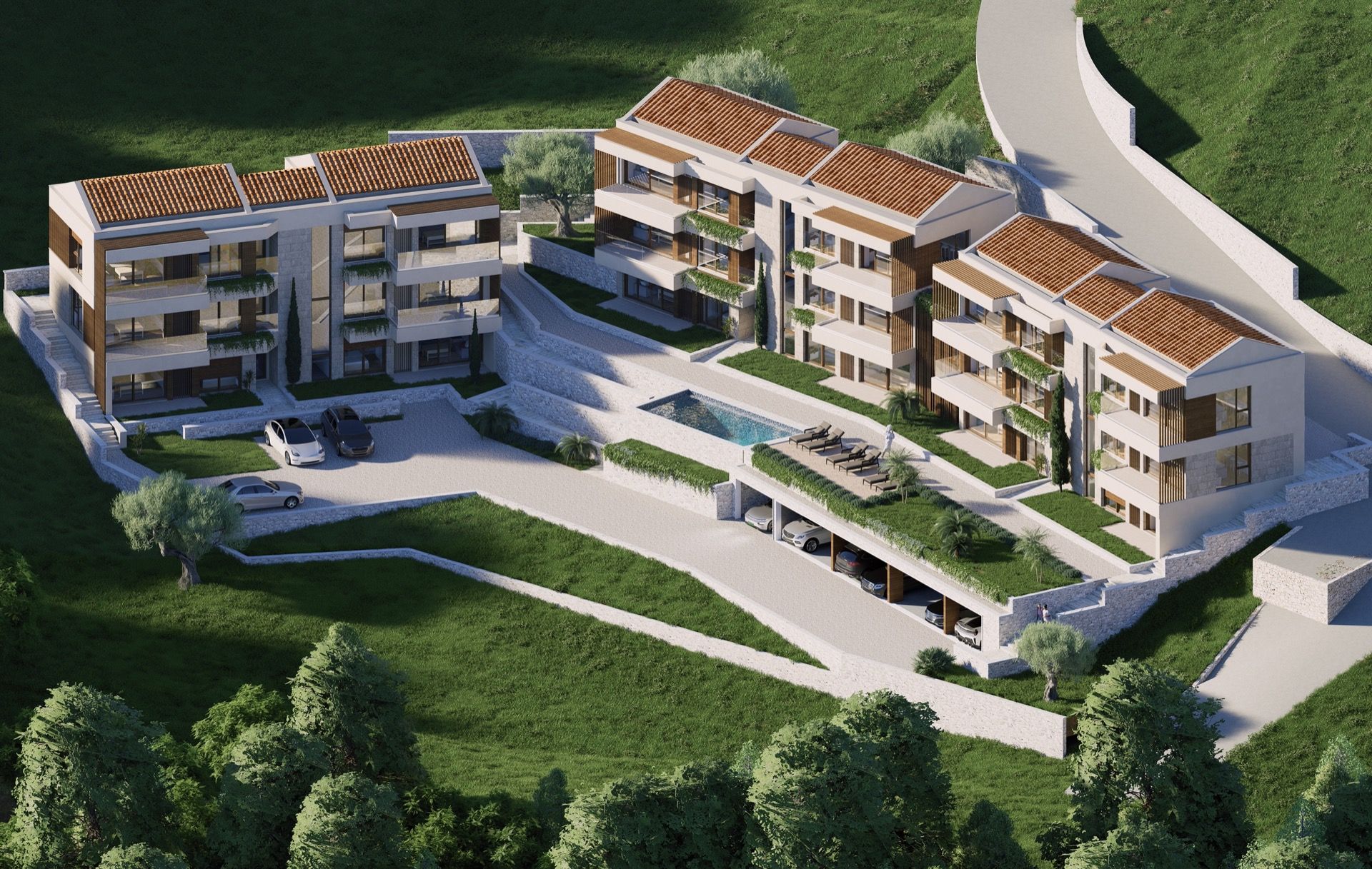Aerial view of a residential complex in Blizikuće, Montenegro: modern apartments with a pool, parking, and terraces.