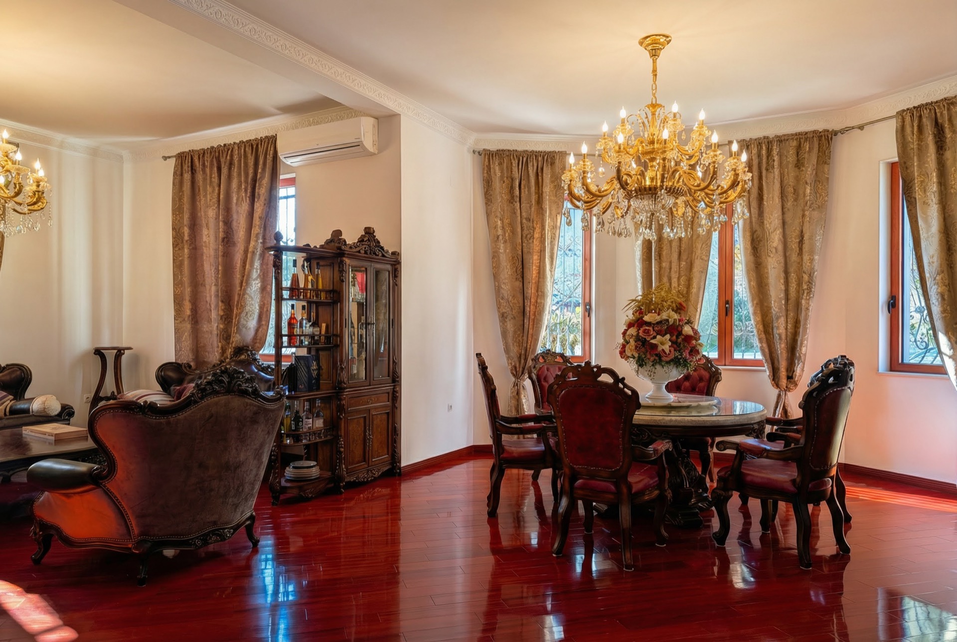 Luxurious living room with classic furniture and a crystal chandelier in a villa in Luštica, Montenegro.
