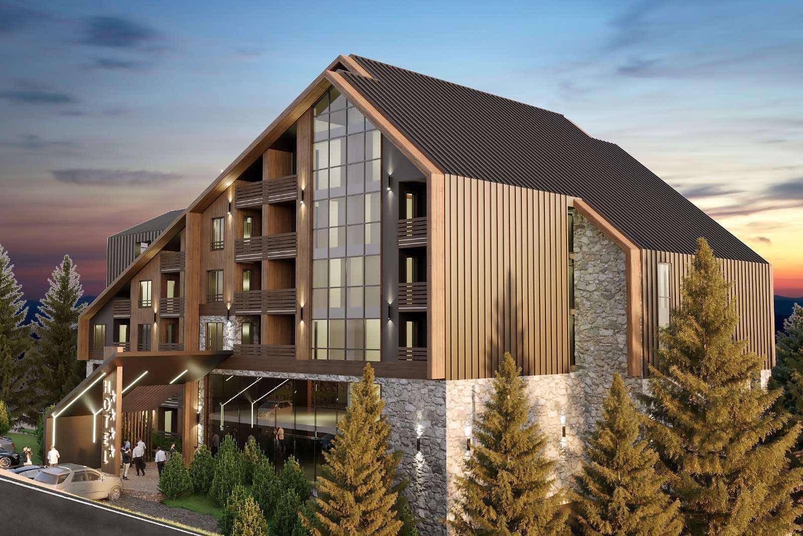Modern chalet-style hotel with stone and wood finishes in Kolašin, Montenegro: front view of the building.