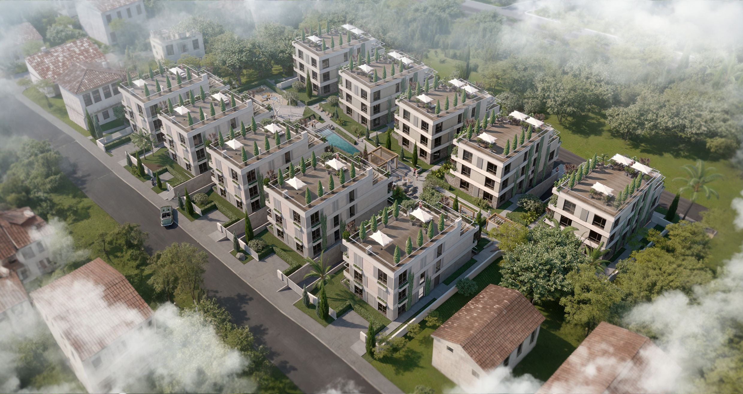 Aerial view of a modern residential complex in Tivat, Montenegro: low-rise buildings with terraces, a swimming pool, and a garden.