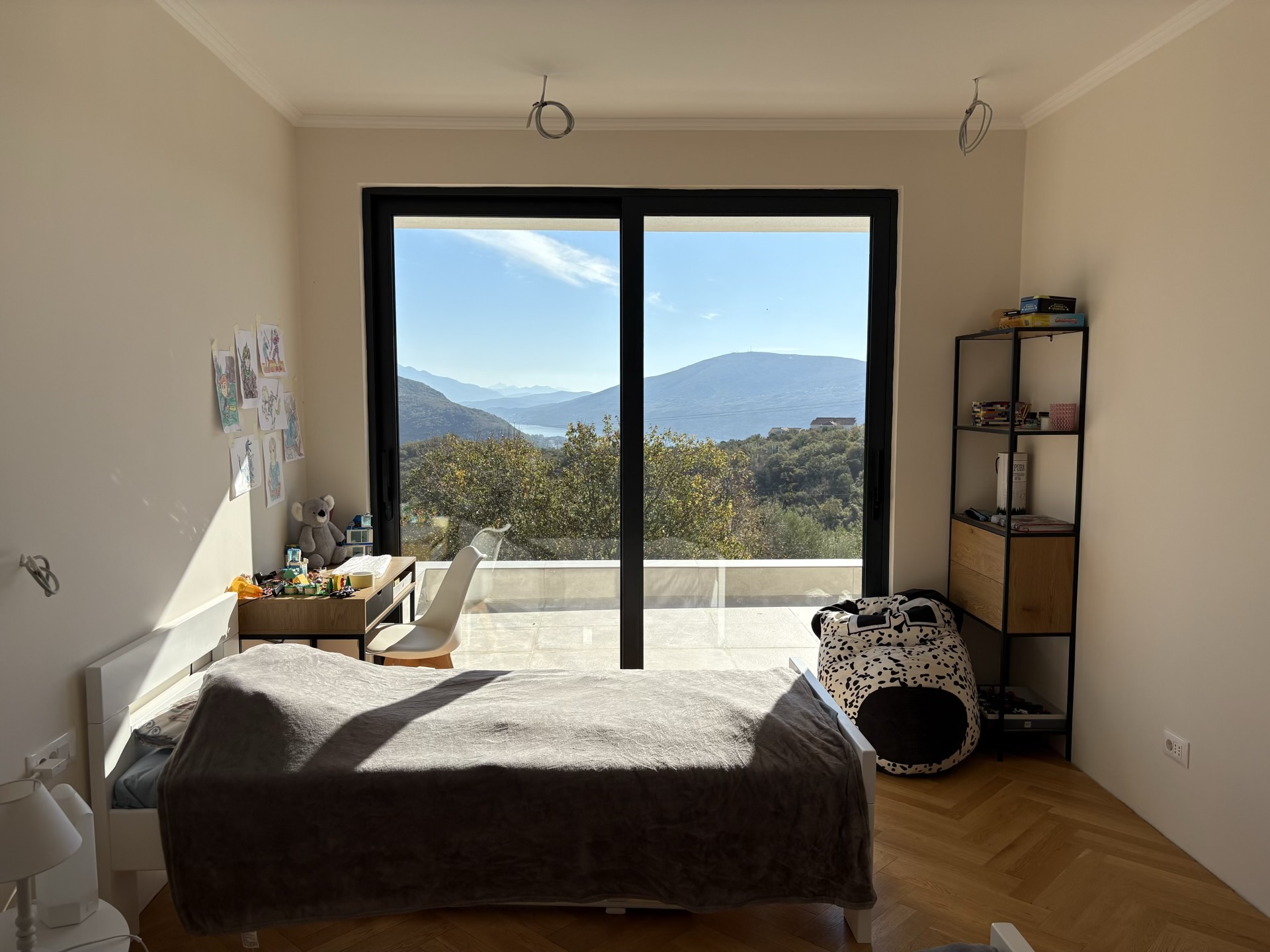 Children's bedroom with panoramic views of the mountains and sea in a residential complex, Herceg Novi, Montenegro.