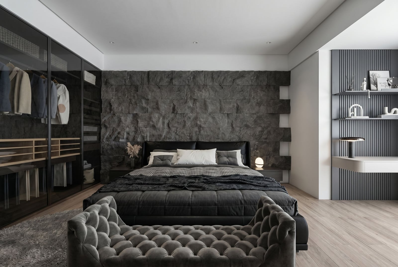 Modern bedroom in a penthouse in Bečići, Montenegro: stone wall, double bed, and built-in wardrobe.