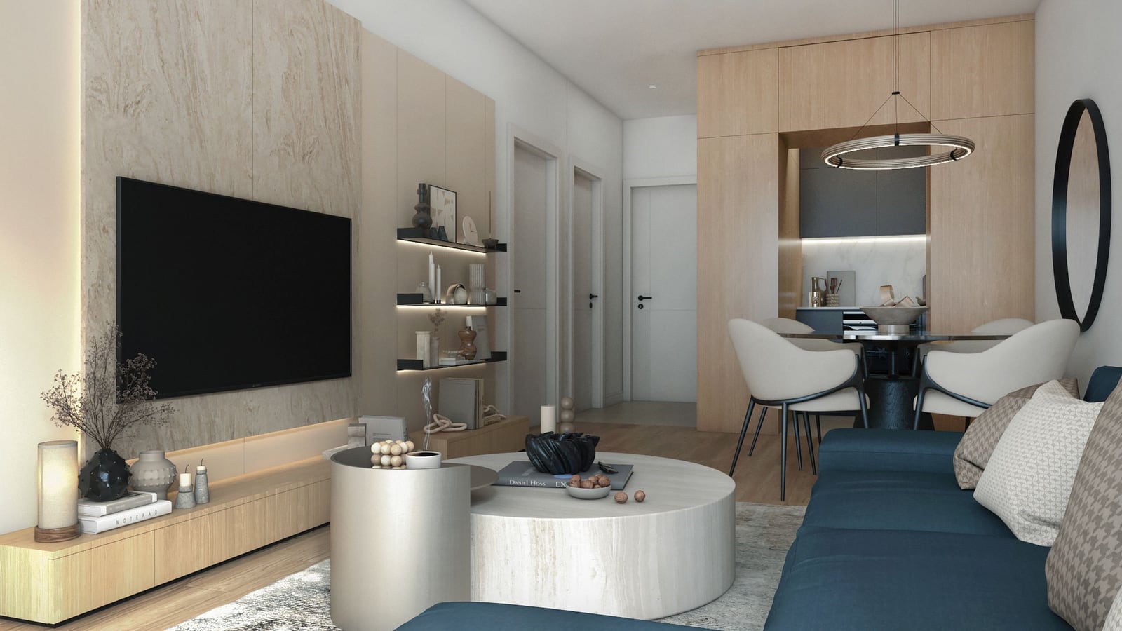Modern living room with kitchen in Bar, Montenegro: stylish interior, blue sofa, stone finishes, and decor.