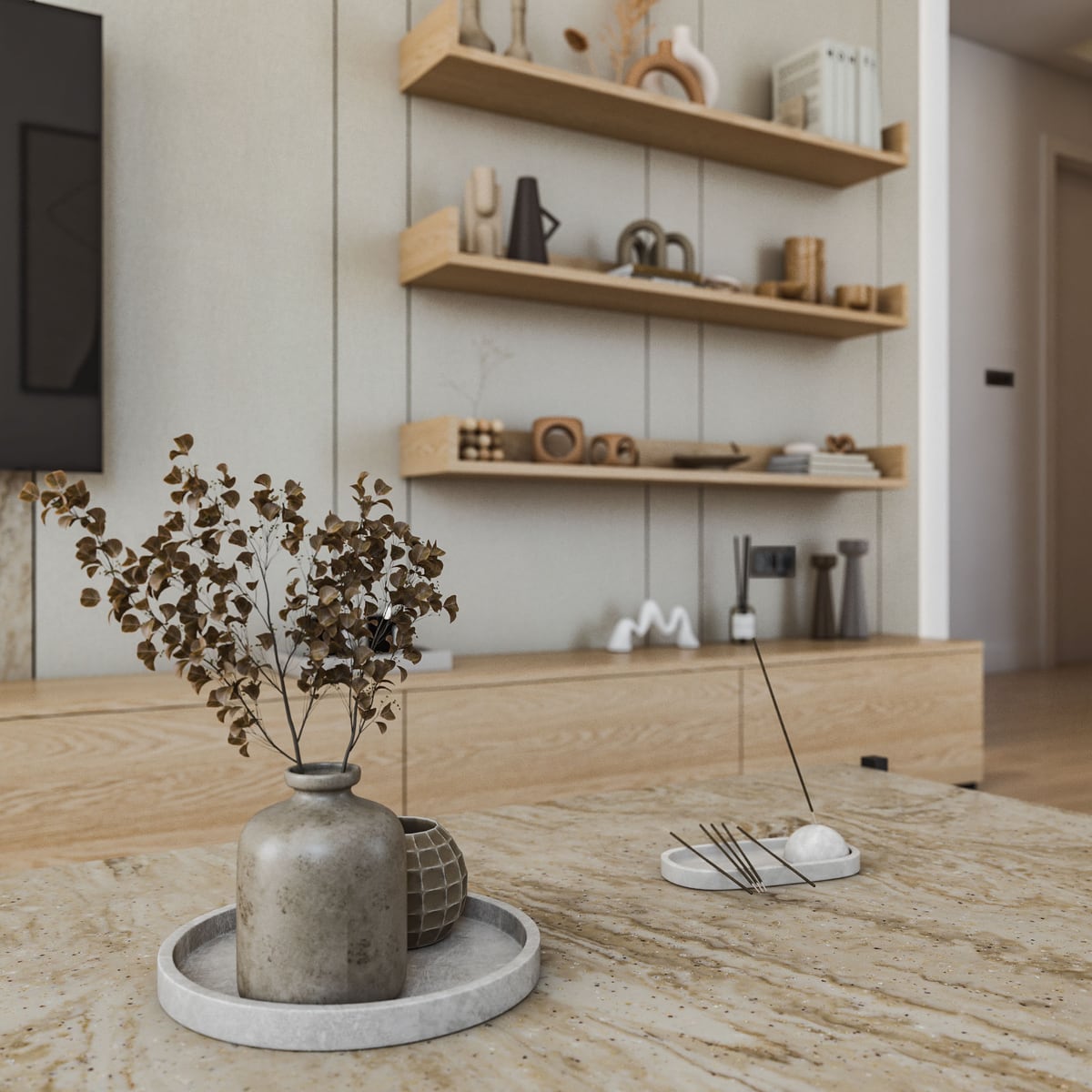Living room interior featuring wooden shelves, a low cabinet, and decor on a marble table.