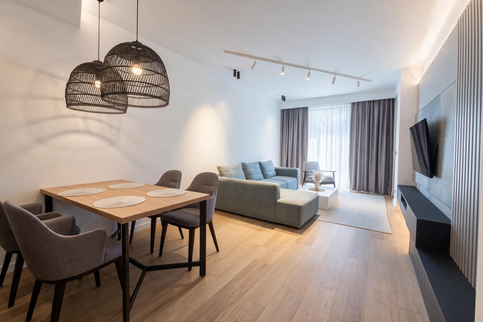 Modern living room with dining area and furniture in an apartment in Budva, Montenegro