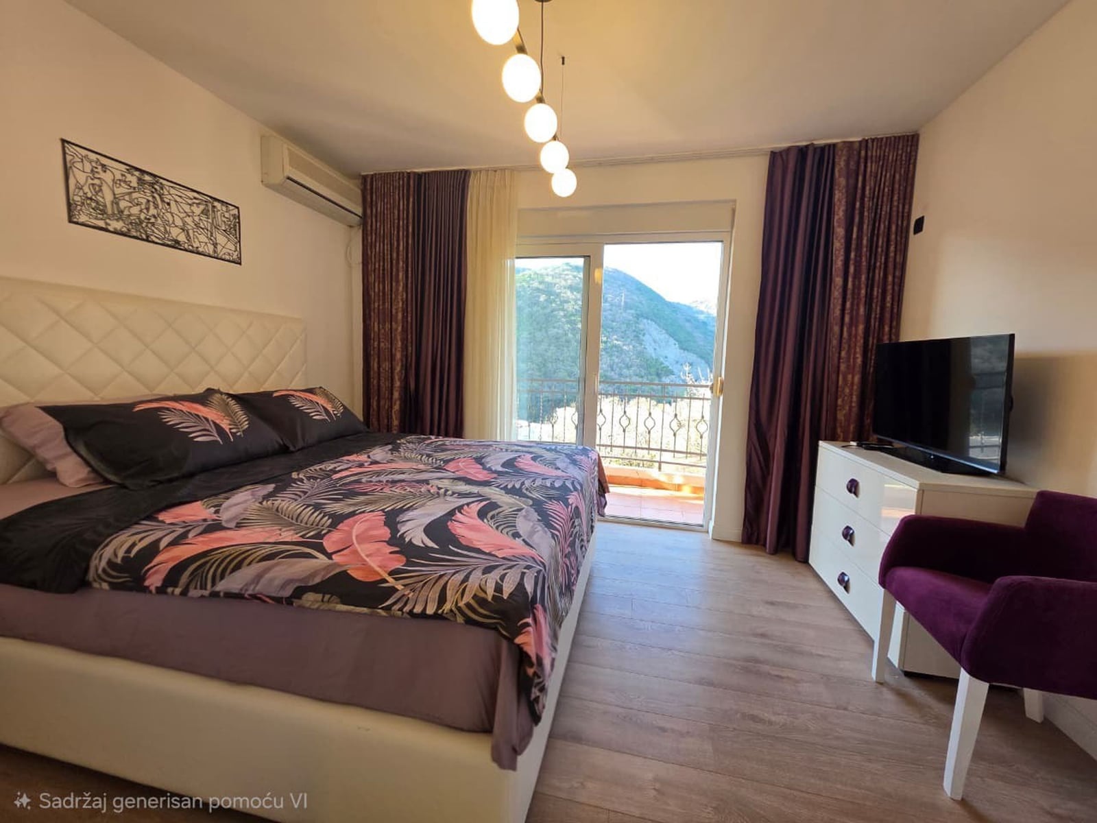Cozy bedroom with a double bed and mountain views in an apartment in Bečići, Montenegro. Modern interior.