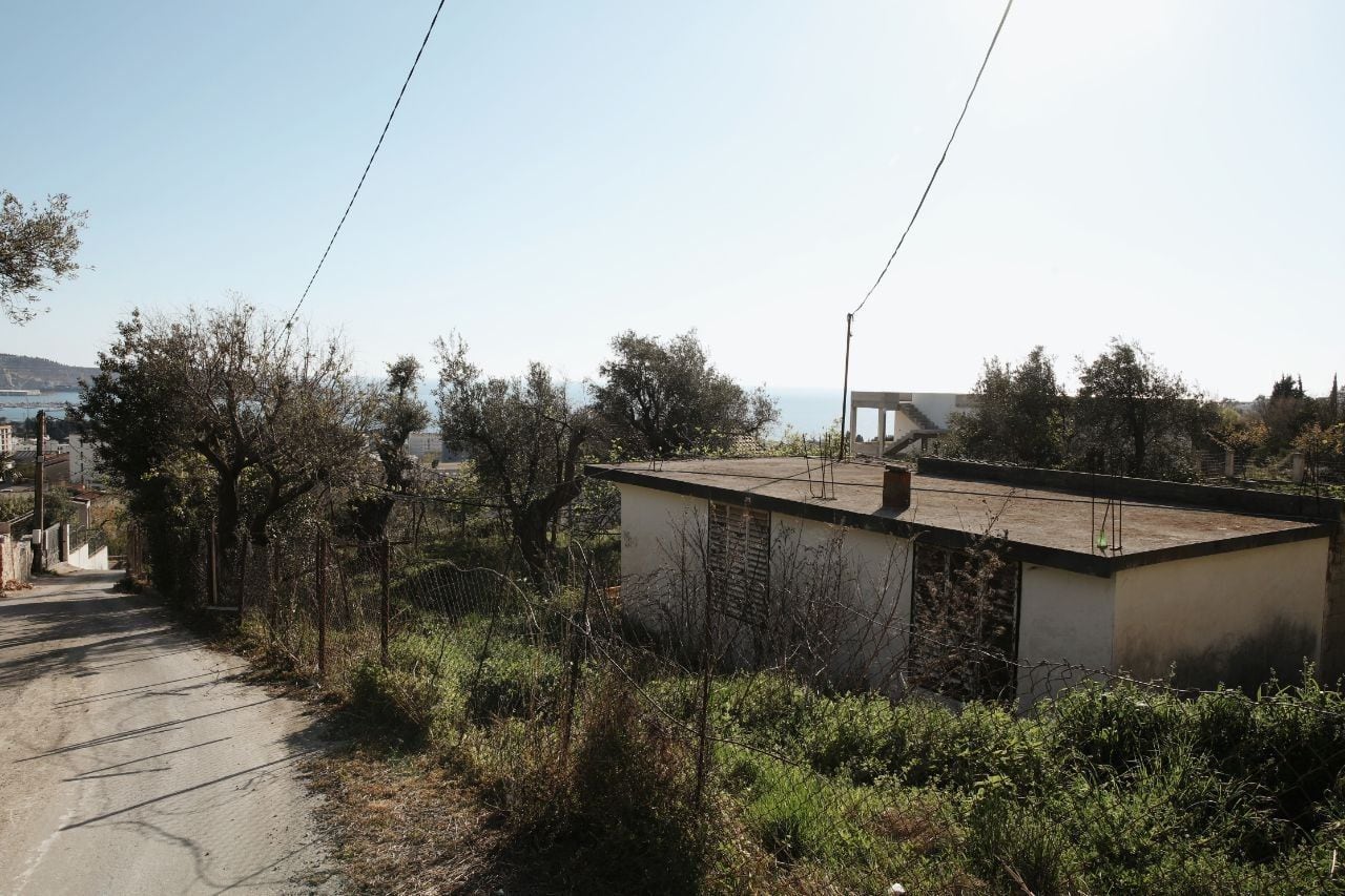 Land plot with a house for reconstruction in Shushan, Bar, Montenegro, with sea views and olive trees.