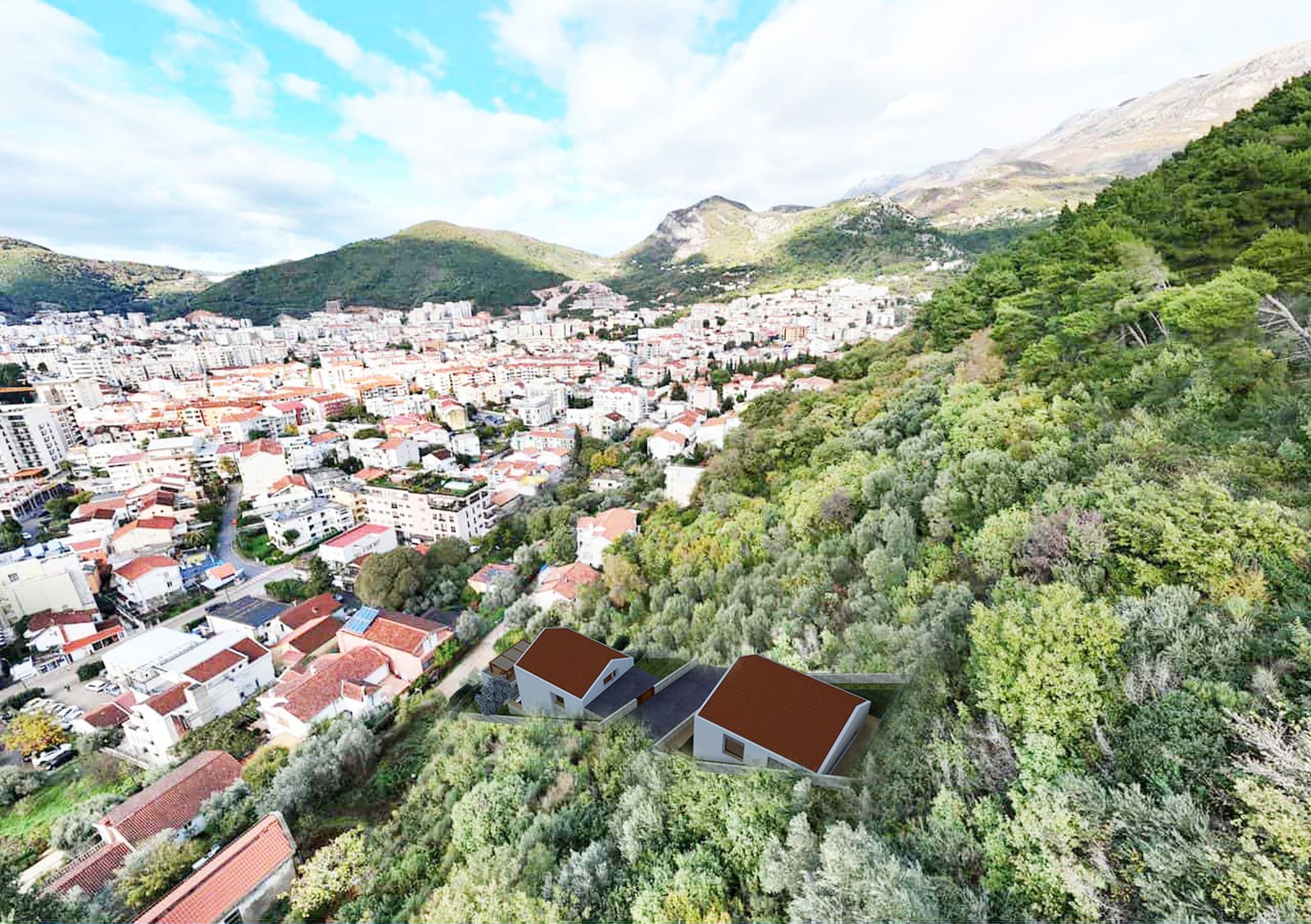 Building plot in Budva, Montenegro: aerial view of a two-house project nestled among mountains and greenery.