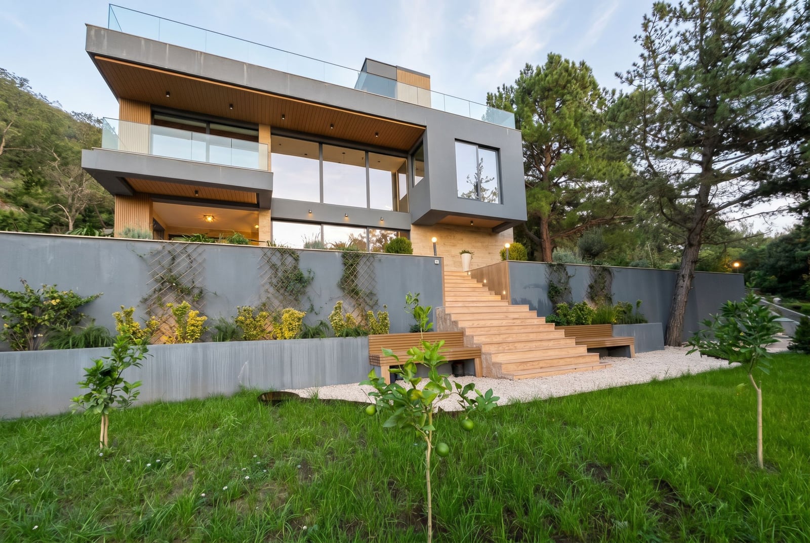 Modern villa in Kavac, Montenegro: facade with panoramic windows, terrace, wooden staircase, and garden.