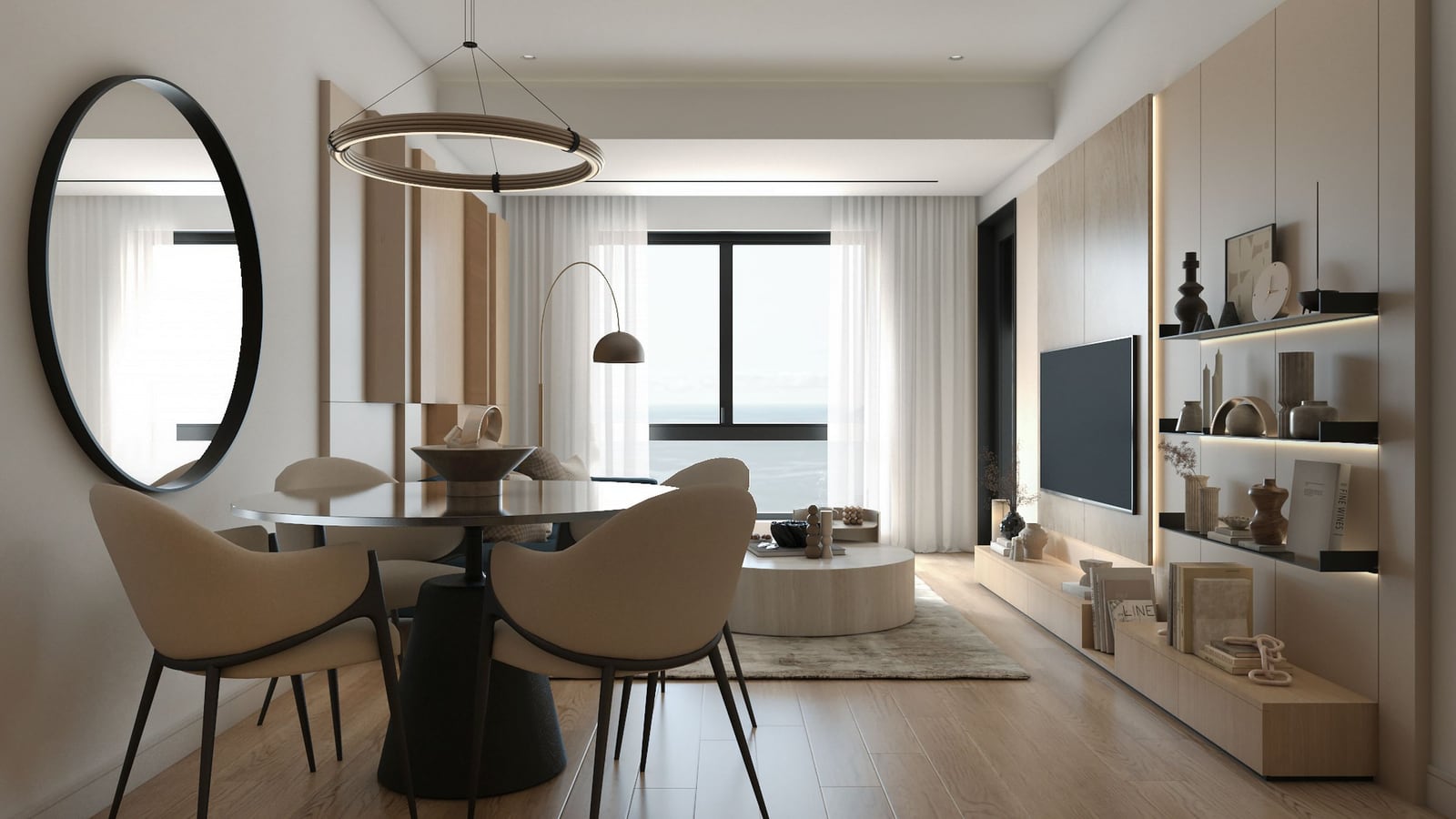 Modern living room with sea view in Bar residential complex, Montenegro: stylish furniture, round mirror, and light finishes.