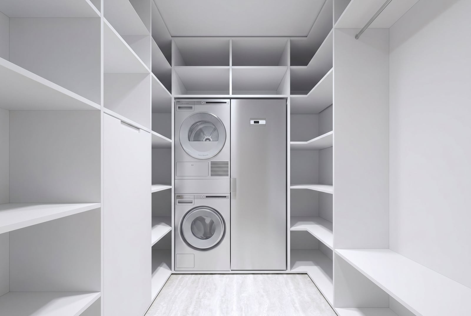 White walk-in closet with a built-in washer and dryer in an apartment at the Sveti Stefan residential complex, Montenegro.