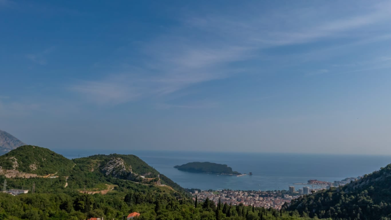Panoramic view of the sea, St. Nicholas Island, and the city of Budva, Montenegro from the terrace of Villa No. 2669.