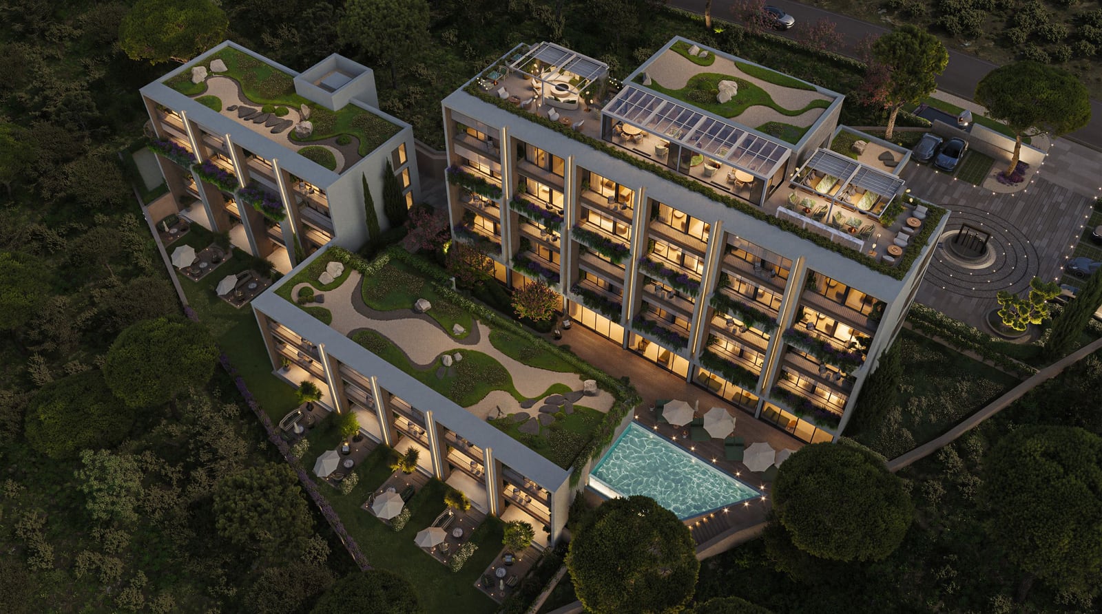 Aerial view of a modern residential complex in Kumbor, Montenegro: a residential complex with a pool, terraces, and green roofs.