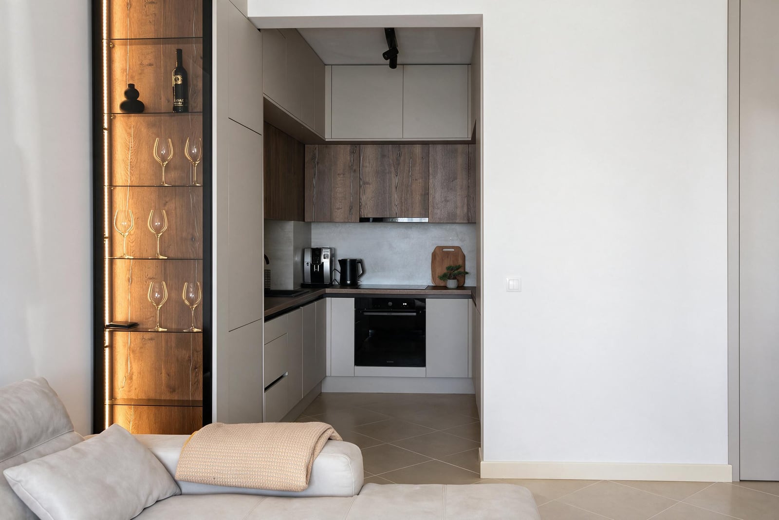 Modern kitchen in an apartment in Dobrota, Montenegro: built-in furniture, showcase lighting, and quality finishes.