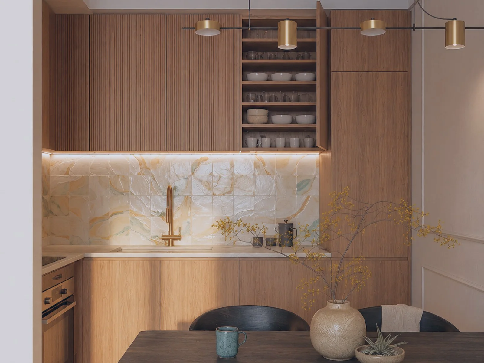 Modern kitchen featuring wooden cabinetry, marble backsplash tiles, gold fixtures, open shelving with dishware, and a dining table.