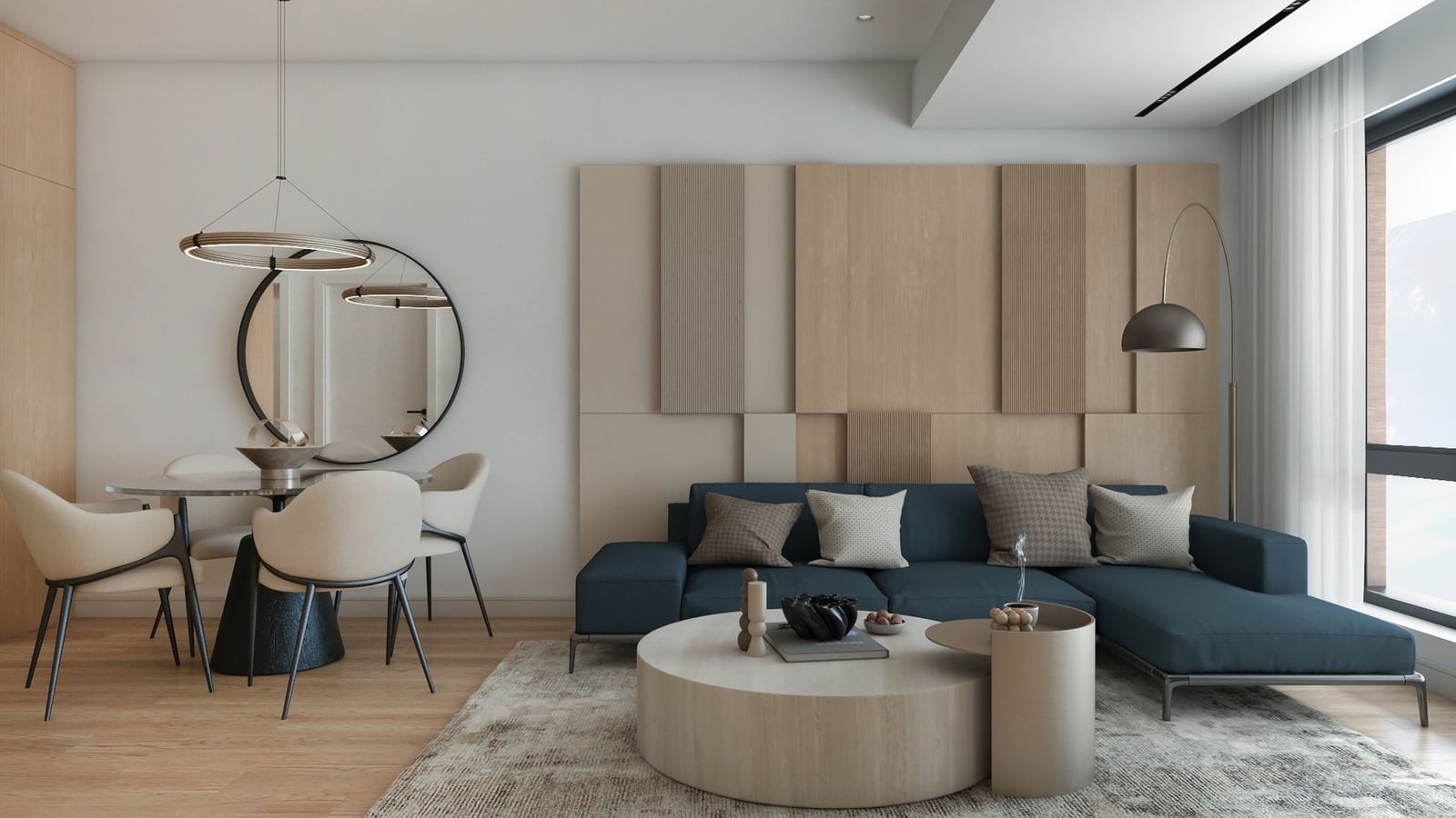 Modern living room in a residential complex in Bar, Montenegro: blue sofa, wooden wall panels, and dining area with mirror.