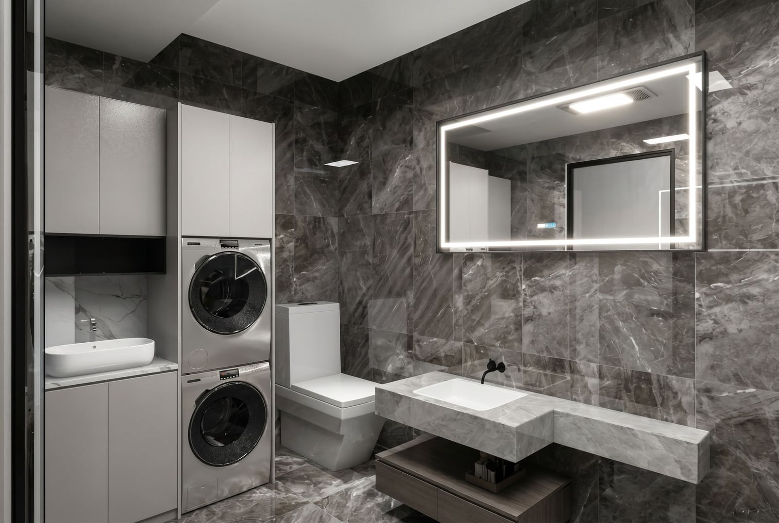 Modern bathroom in an apartment, Becici, Montenegro: marble finishes, built-in appliances, and stylish lighting.