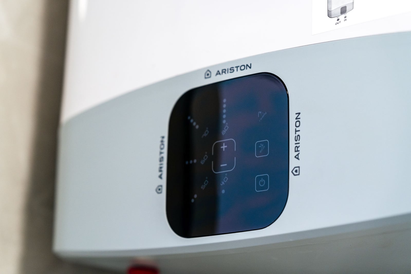 Modern Ariston electric water heater with touch control panel in an apartment, Budva, Montenegro.