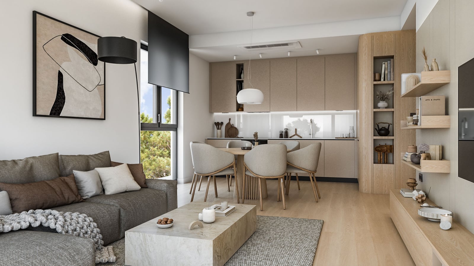 Modern living room featuring a grey sofa, stone coffee table, and an open kitchen area in the background.