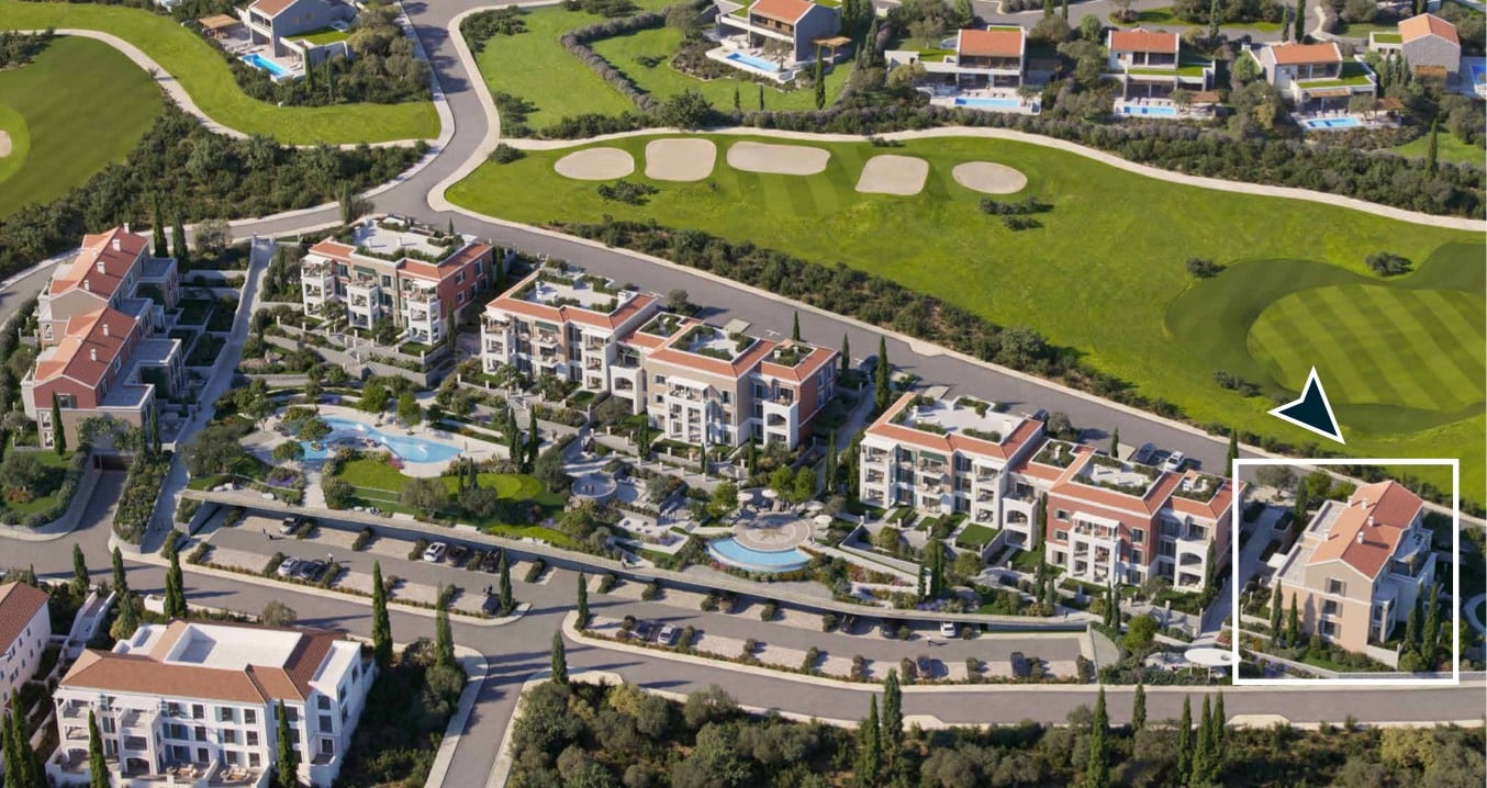 Aerial view of a luxury residential complex in Luštica, Montenegro, with a pool and golf course next to the houses.