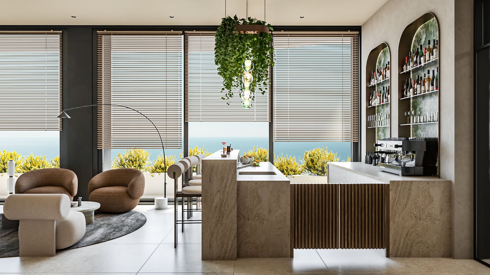 Modern lounge area featuring a bar counter, espresso machine, and armchairs near panoramic ocean-view windows.