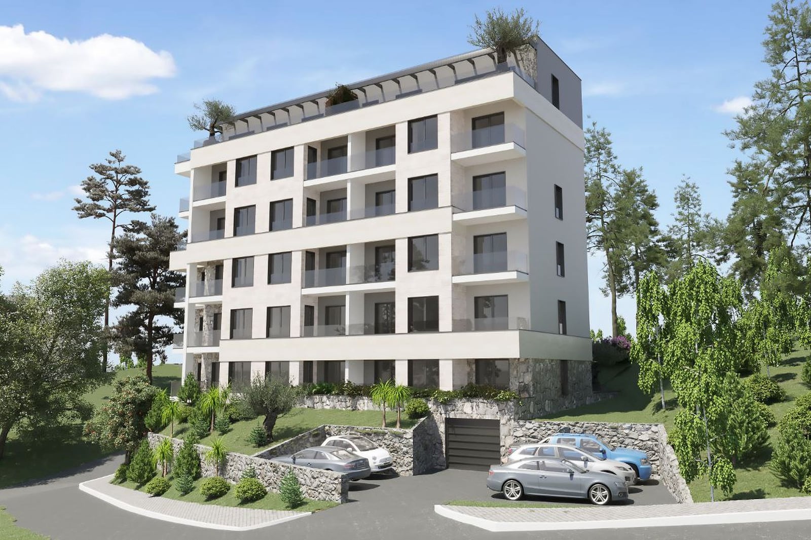 Modern residential complex in Budva, Montenegro: facade with balconies, panoramic windows, and parking by the building.