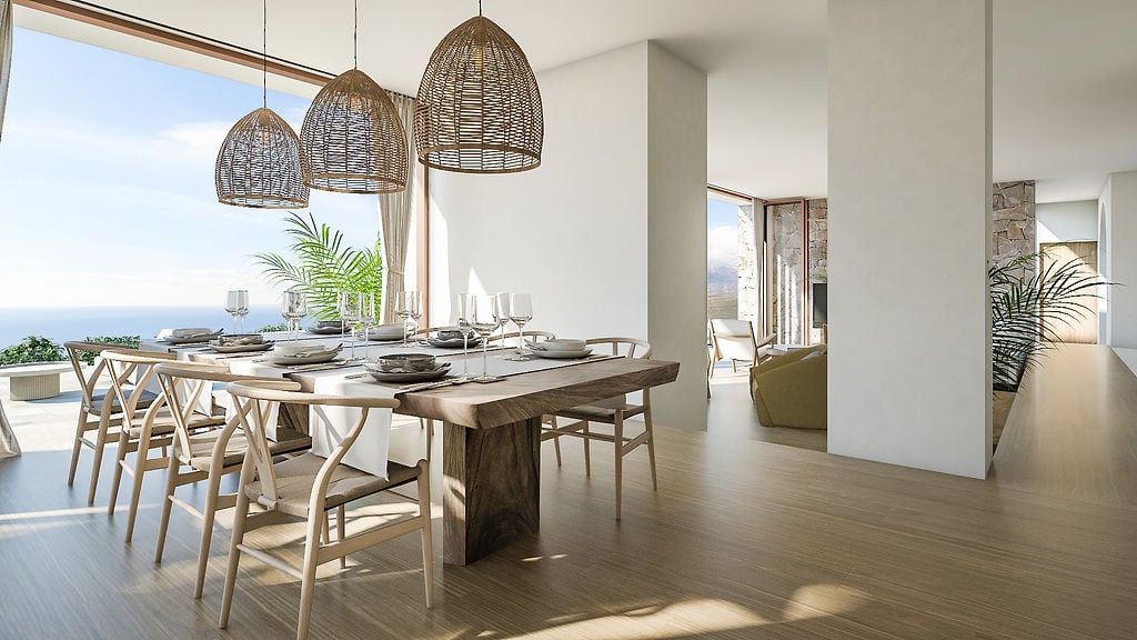 Modern living room with dining area and sea view in a luxury villa, Luštica, Montenegro: wooden table and decor.
