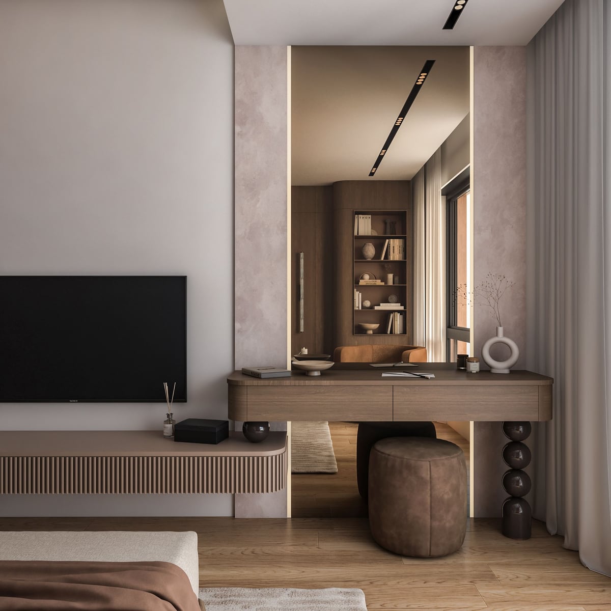Modern bedroom in the Bar residential complex, Montenegro: wooden vanity, backlit mirror, and TV area in the interior.