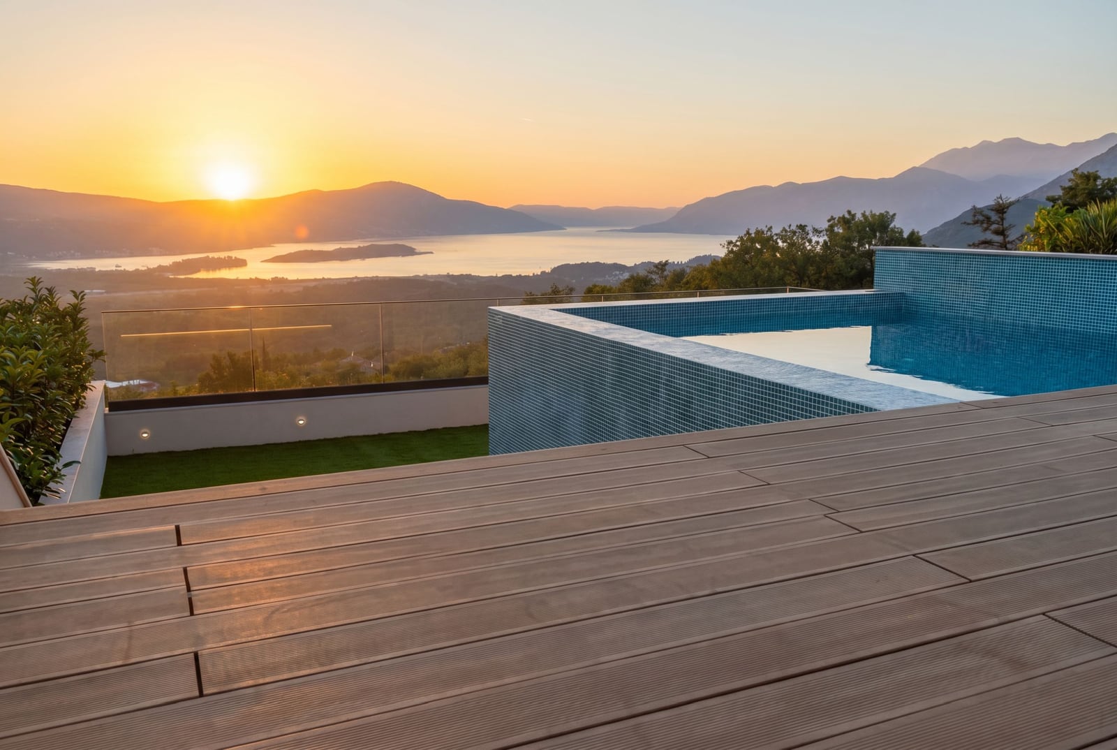 Infinity pool on the villa terrace in Kavac, Montenegro, with panoramic sunset views and the Bay of Kotor.